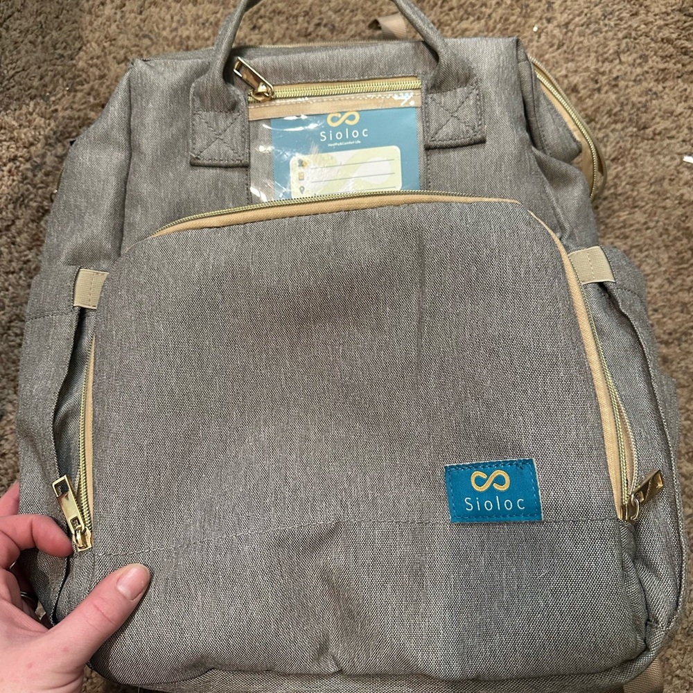Grey diaper bag, like new, used a hand full of times